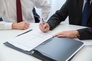 Attorneys at Judd Shaw Injury Law preparing the papers for a client after a truck accident.